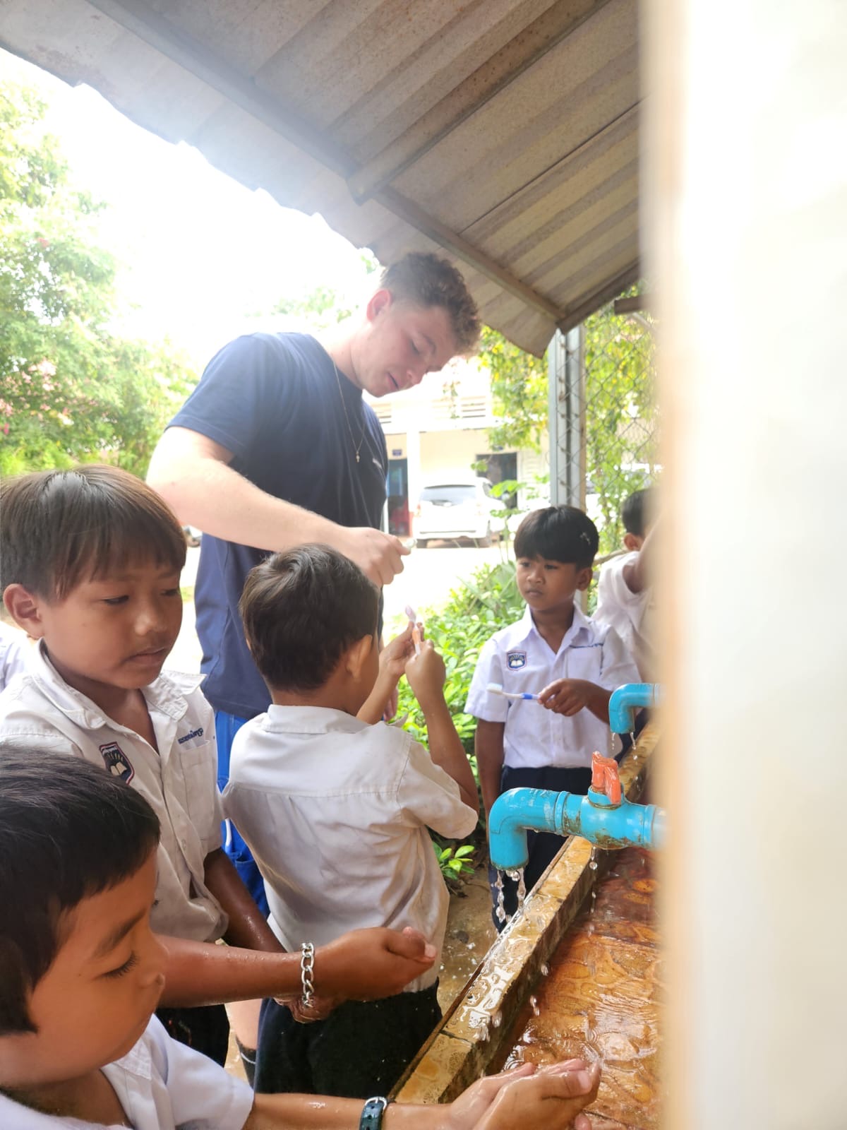 Geberit trainees installing sanitation facilities at Svay Thom School (13)