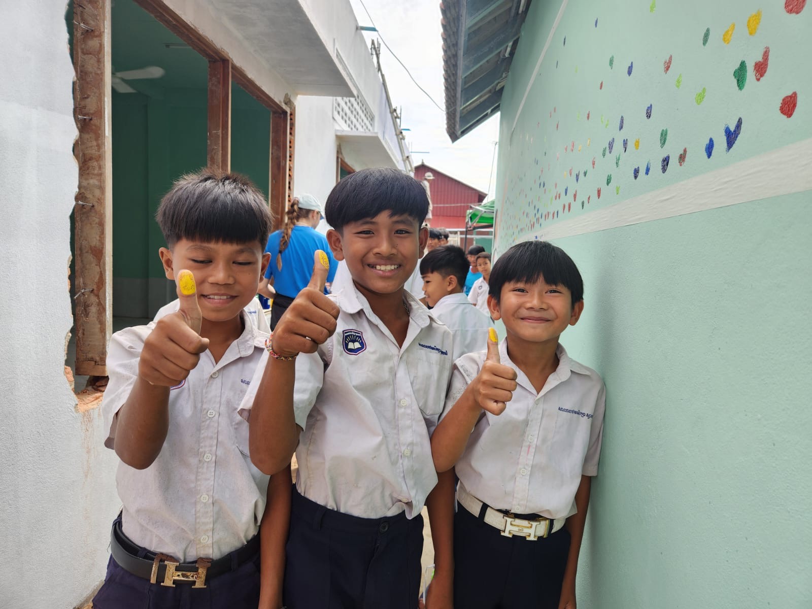 Geberit trainees installing sanitation facilities at Svay Thom School